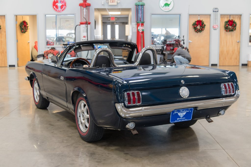 Illustration for article titled I Dunno About This 1997 Miata That's Been 'Converted' Into A 1965 Mustang